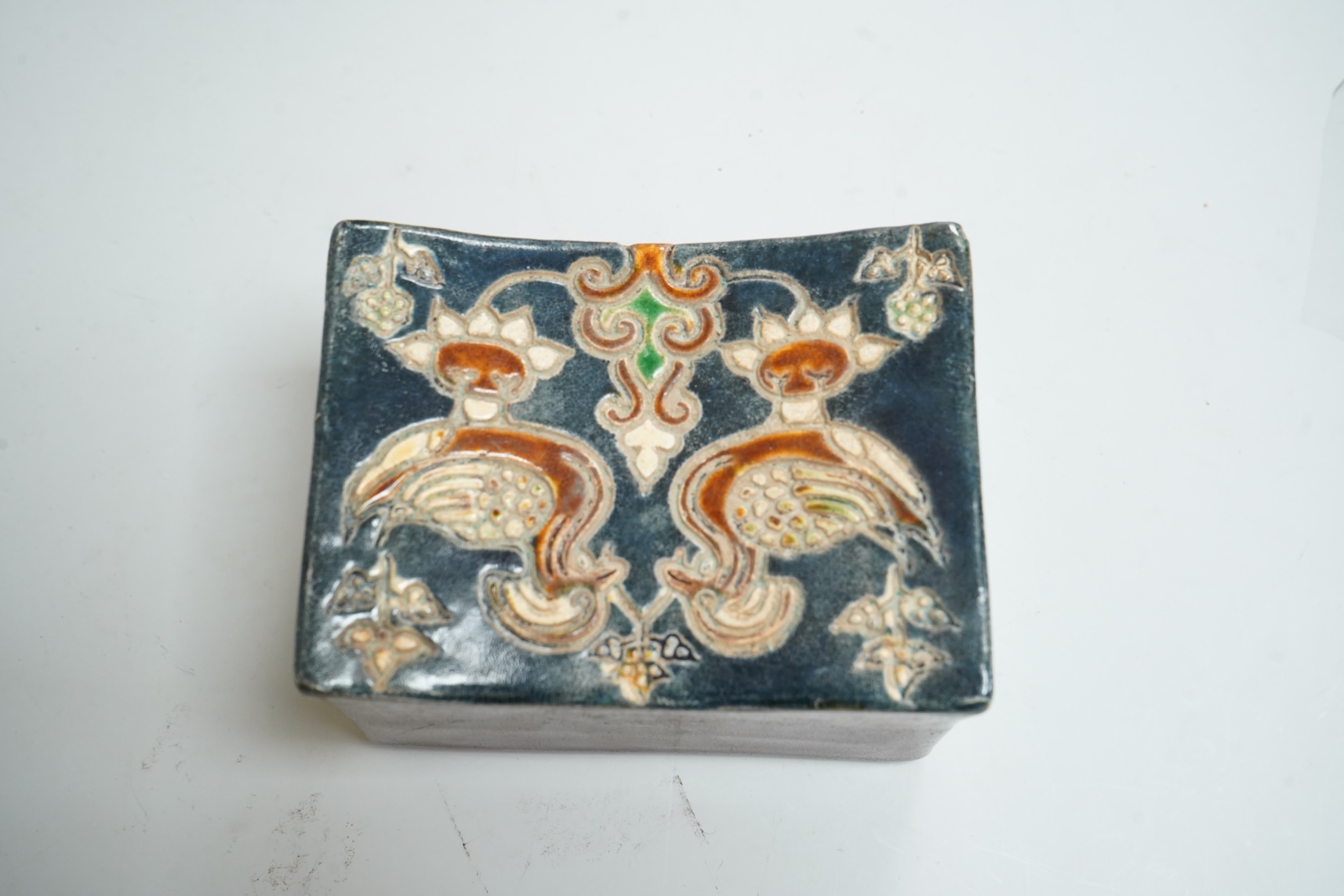 A Chinese stone ware arm rest, 10cm wide